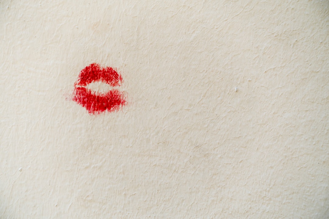 red-stain-on-white-wall-NpeDXZKscsM