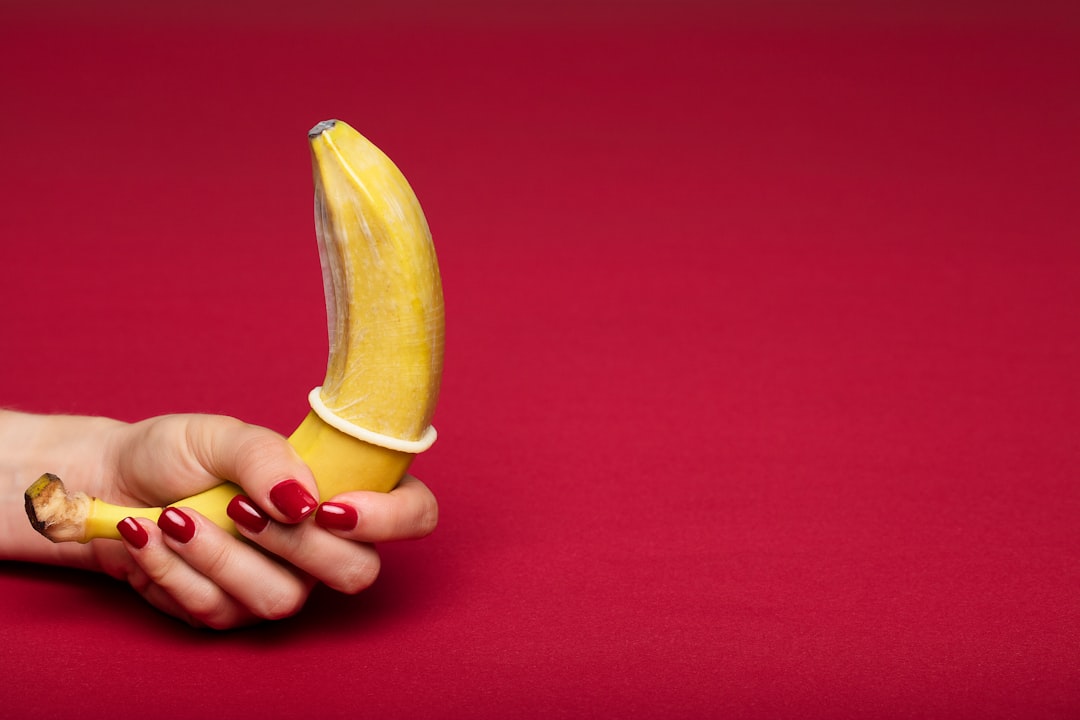 person-holding-yellow-banana-fruit-bk36b0t2MXw