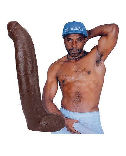 Adult star Brickzilla holding his massive 13 inch molded clone dildo showing realistic 1:1 scale