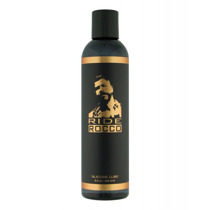Black and gold bottle of Ride Rocco silicone lubricant on a white background