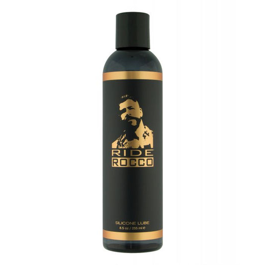 Black and gold bottle of Ride Rocco silicone lubricant on a white background