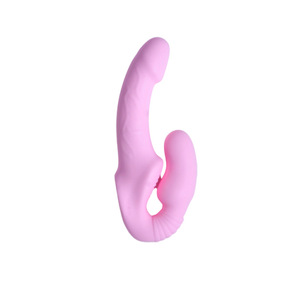Pink silicone strap  on dildo  a white background